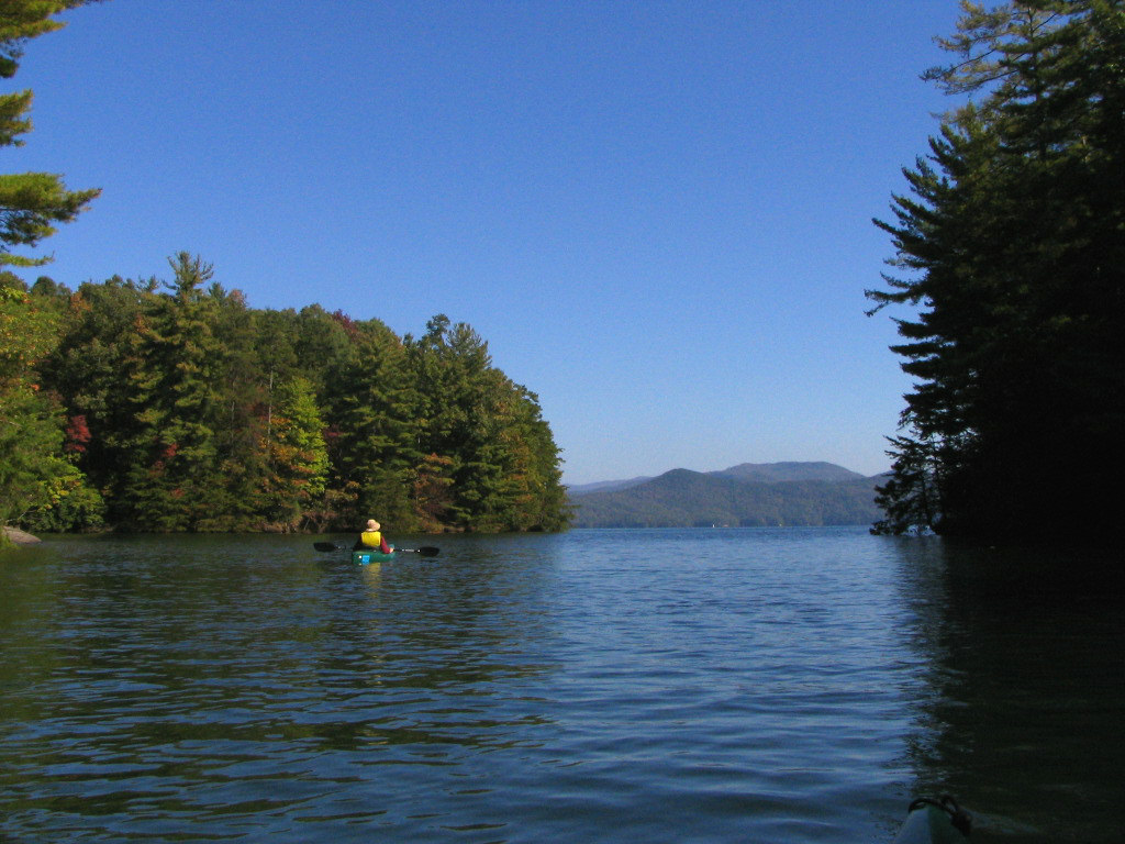 A paddler crossing Lake Jocassee at Devils Fork State Park